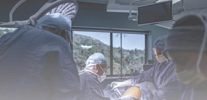 Dr CR Oosthuizen performing unicompartmental knee arthroplasty in theatre at Johannesburg Surgical Hospital
